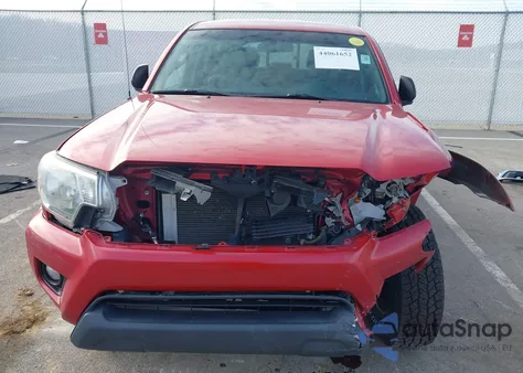 2015 Toyota Tacoma Base V6 z USA, uszkodzony, nr VIN 3TMLU4EN9FM203729